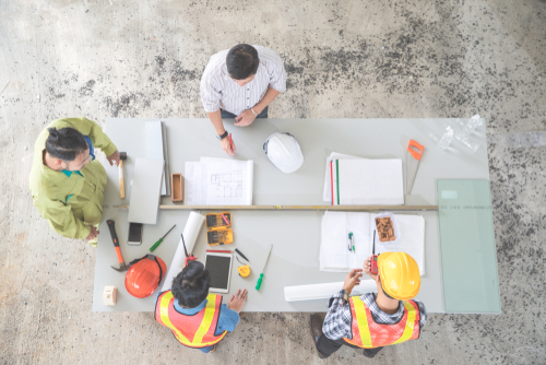 engineers meeting construction site